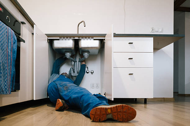 Professional Emergency Plumber technician working in Wallingford, CT